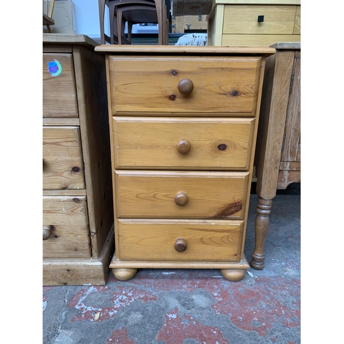 128 - A modern pine bedside chest of drawers