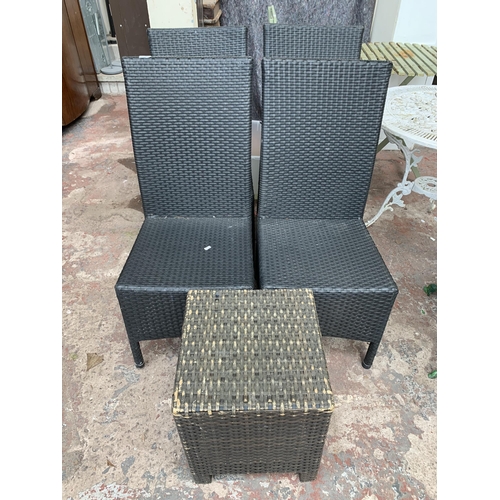 138 - Five pieces of plastic rattan effect patio furniture, four chairs and one side table