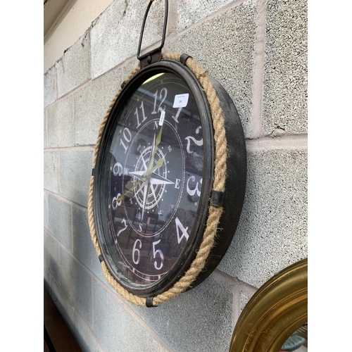 14 - A modern 'The Range' nautical wall clock - approx. 57cm high x 47cm diameter