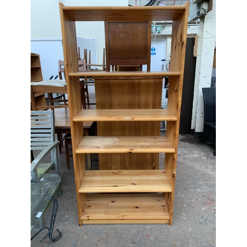 147 - A modern pine five tier bookshelf - approx. 170cm high x 80cm wide x 33cm deep