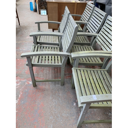 148 - Six grey painted wooden garden armchairs