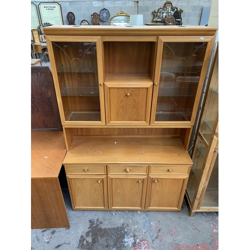 152 - A mid/late 20th century teak display unit and corner unit