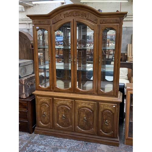 161 - A French style carved walnut display cabinet - approx. 209cm high x 143cm wide x 40cm deep