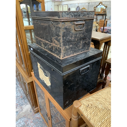 162 - Two early 20th century black painted steel deed boxes - largest approx. 41cm high x 61cm wide x 43cm... 