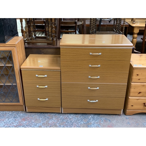 165 - A mid/late 20th century teak effect chest of drawers and bedside chest of drawers