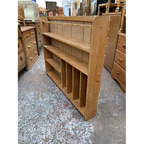 167 - A pine wall mountable shelving unit - approx. 89cm high x 109cm wide x 14cm deep