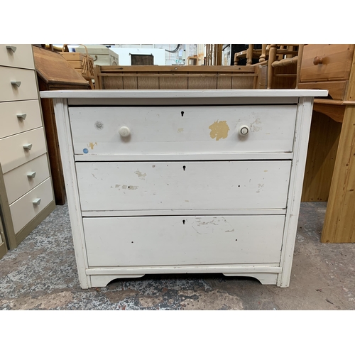 168 - A late 19th/early 20th century white painted chest of drawers - approx. 72cm high x 86cm wide x 48cm... 