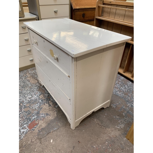 168 - A late 19th/early 20th century white painted chest of drawers - approx. 72cm high x 86cm wide x 48cm... 