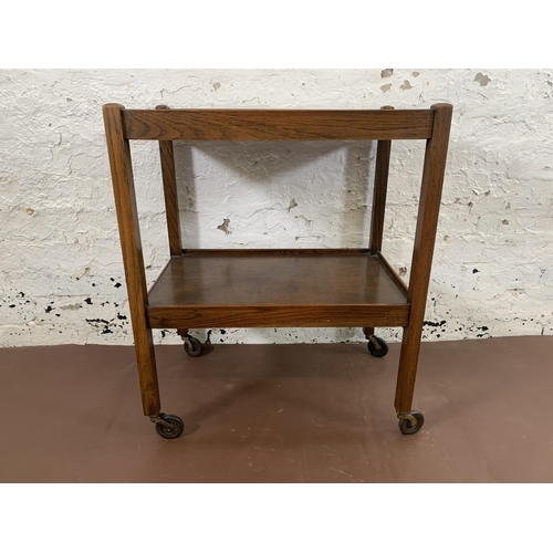 181 - An early/mid 20th century oak two tier tea trolley