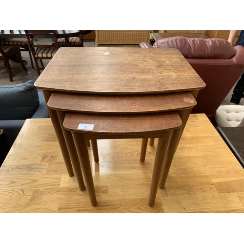 182 - A mid 20th century teak nest of tables - approx. 48cn high x 54cm wide x 40cm deep