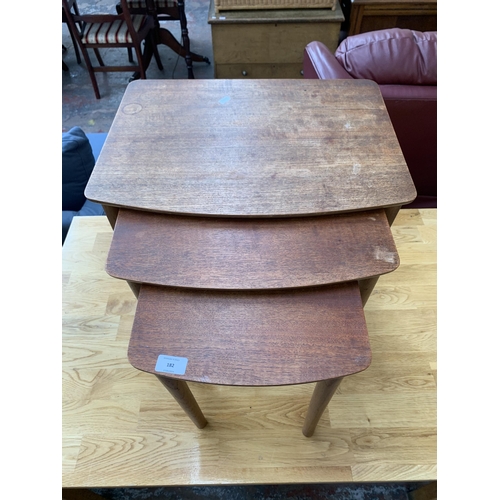 182 - A mid 20th century teak nest of tables - approx. 48cn high x 54cm wide x 40cm deep