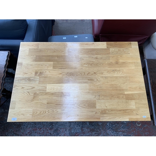 183 - A modern oak rectangular dining table - approx. 76cm high x 75cm wide x 118cm long