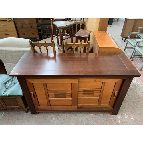 188 - An Ernest Menard mahogany and cherry wood sideboard with two sliding doors - approx. 90cm high  x 15... 