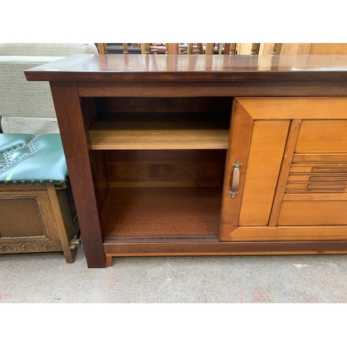 188 - An Ernest Menard mahogany and cherry wood sideboard with two sliding doors - approx. 90cm high  x 15... 