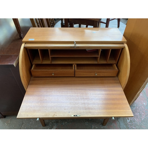 189 - A mid 20th century Remploy teak roll top bureau