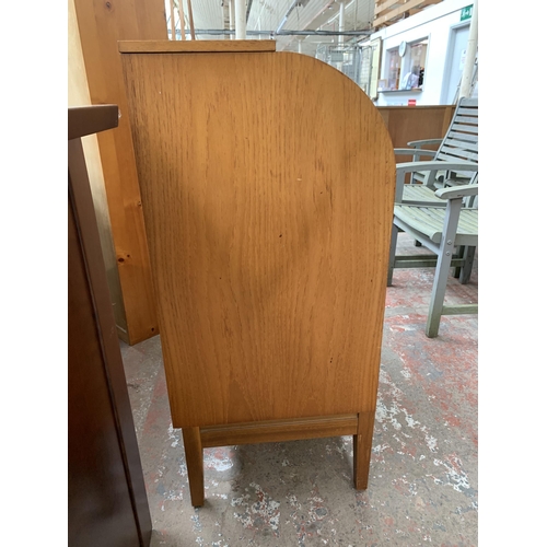 189 - A mid 20th century Remploy teak roll top bureau