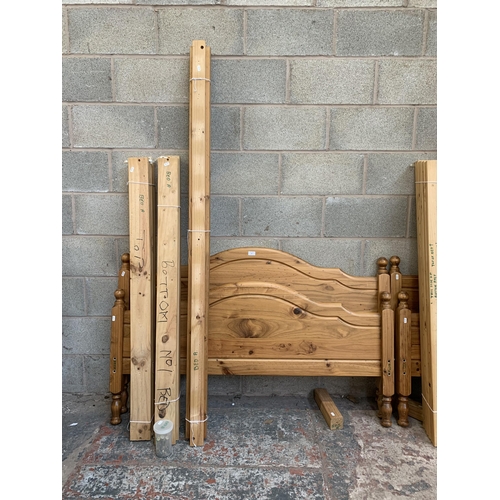 19 - A modern pine double bed frame