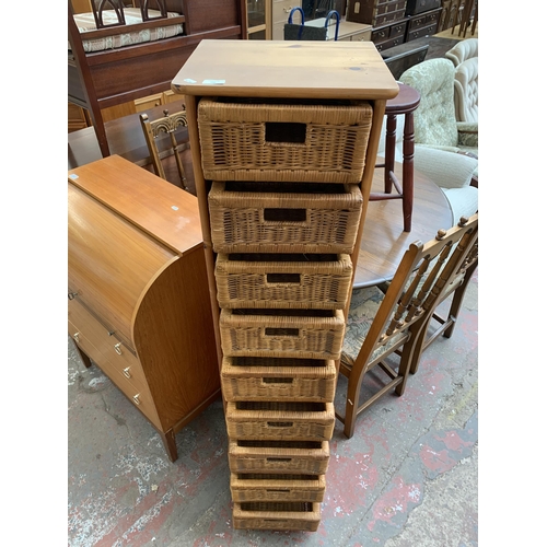 190 - A modern pine and wicker chest of drawers - approx. 154cm high x 40cm wide 34cm deep