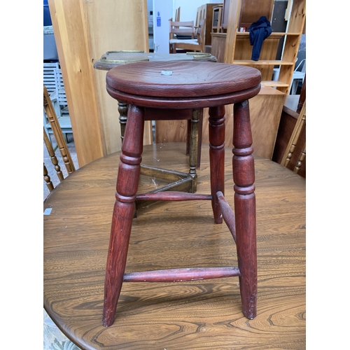 191 - Three pieces of occasional furniture, one Victorian style stained elm and beech circular top farmhou... 