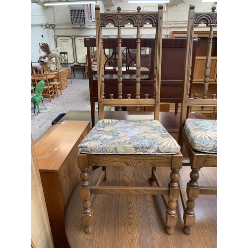 192 - An Ercol Old Colonial elm and beech drop leaf dining table and four Yorkshire dining chairs - table ... 