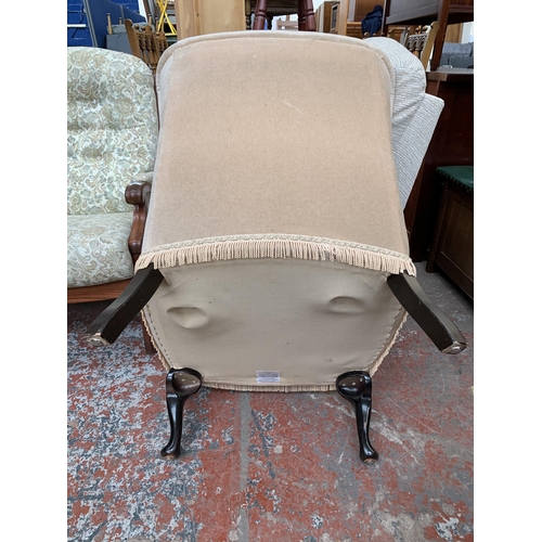 195 - A pair of late 20th century Victorian style button back fabric upholstered armchairs on cabriole sup... 