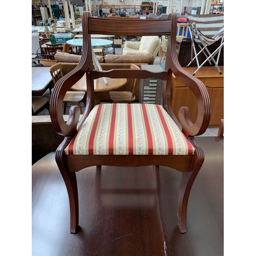 212 - A Georgian style mahogany twin pedestal extending D end dining table and six chairs