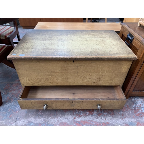 216 - A Victorian scumble pine blanket box with lower drawer - approx. 56cm high x 94cm wide x 56cm deep