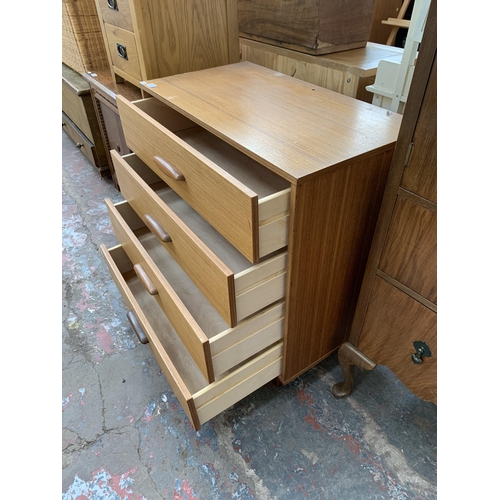 219 - A mid 20th century teak chest of drawers - approx. 83cm high x 75cm wide x 40cm deep