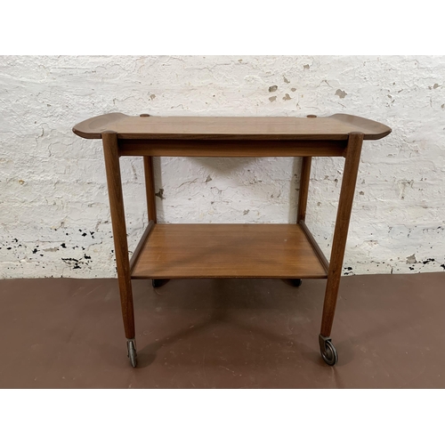 223 - A mid 20th century teak two tier cocktail trolley with removable tray - approx. 70cm high x 46cm wid... 