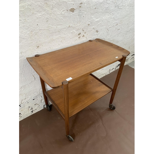 223 - A mid 20th century teak two tier cocktail trolley with removable tray - approx. 70cm high x 46cm wid... 