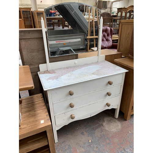 226 - An early/mid 20th century white painted dressing table with upper bevelled edge mirror