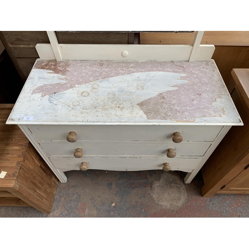 226 - An early/mid 20th century white painted dressing table with upper bevelled edge mirror