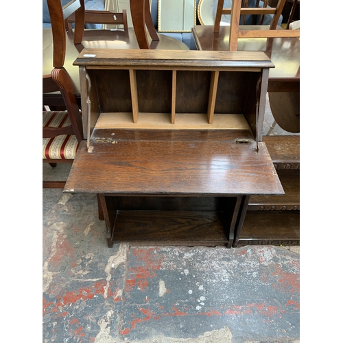 230 - Two pieces of mid 20th century oak furniture, one student's bureau and one three tier bookcase