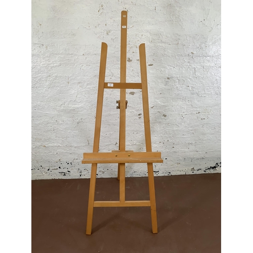 243 - A beech artist's easel - approx. 162cm high