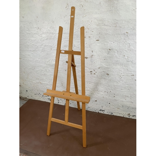 243 - A beech artist's easel - approx. 162cm high