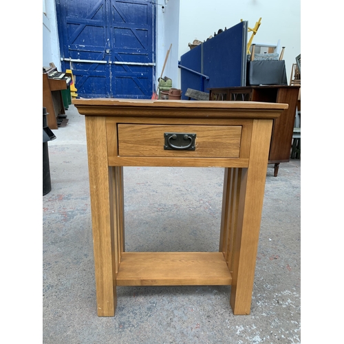 246 - A modern oak side table - approx. 75cm high x 60cm wide x 32cm deep