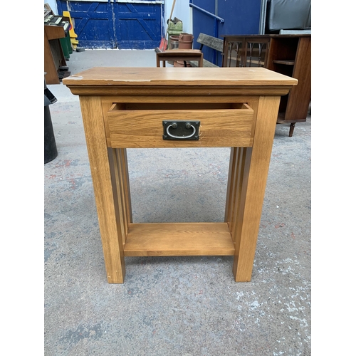 246 - A modern oak side table - approx. 75cm high x 60cm wide x 32cm deep