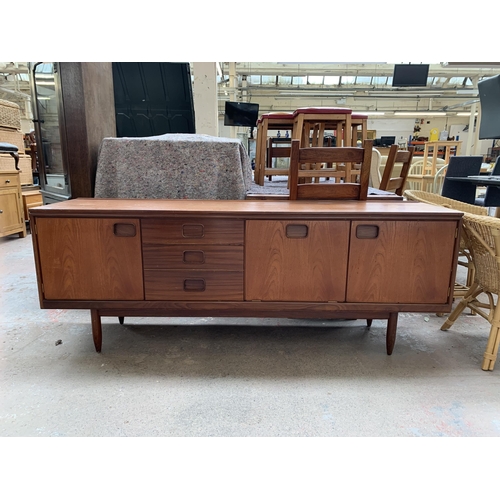 249 - A mid 20th century William Lawrence of Nottingham teak sideboard - approx. 73cm high x 198cm wide x ... 