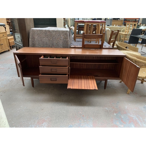 249 - A mid 20th century William Lawrence of Nottingham teak sideboard - approx. 73cm high x 198cm wide x ... 