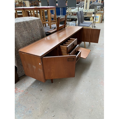 249 - A mid 20th century William Lawrence of Nottingham teak sideboard - approx. 73cm high x 198cm wide x ... 