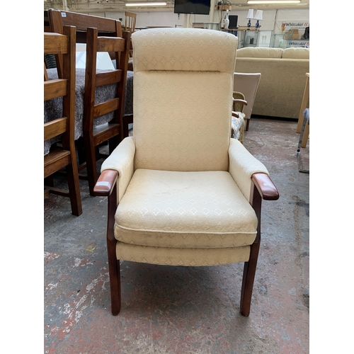 251 - Two late 20th century fabric upholstered and beech armchairs