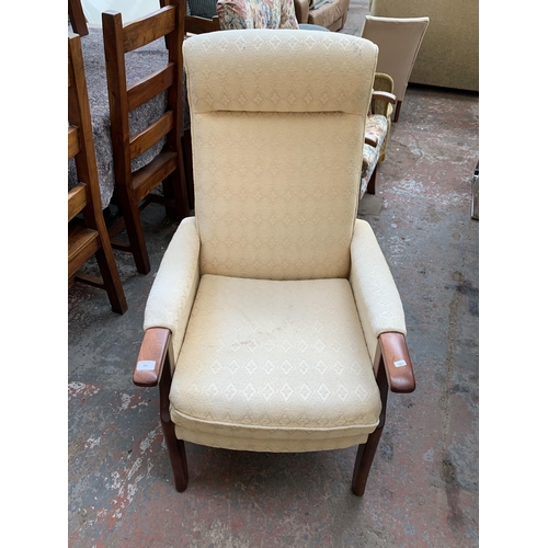 251 - Two late 20th century fabric upholstered and beech armchairs