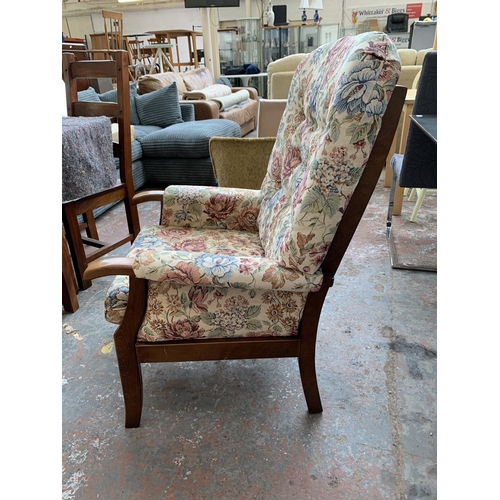 251 - Two late 20th century fabric upholstered and beech armchairs