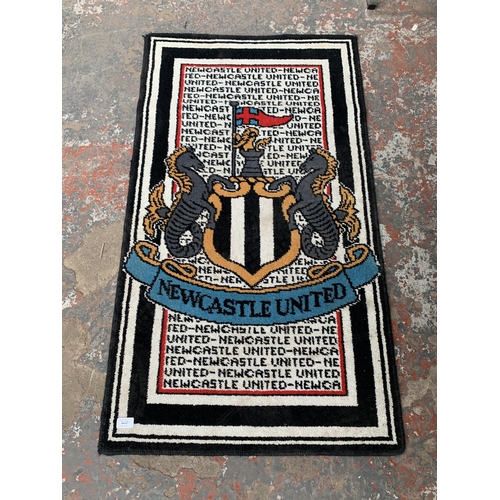 A Trafford Carpets (UK) Limited Club Rugs Newcastle United rug - approx ...