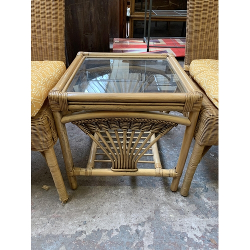 29 - Five pieces of wicker and cane furniture, four dining chairs and one glass top square side table