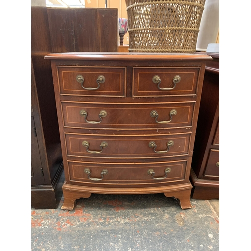 32 - A Georgian style inlaid mahogany miniature bow fronted chest of drawers on bracket supports - approx... 