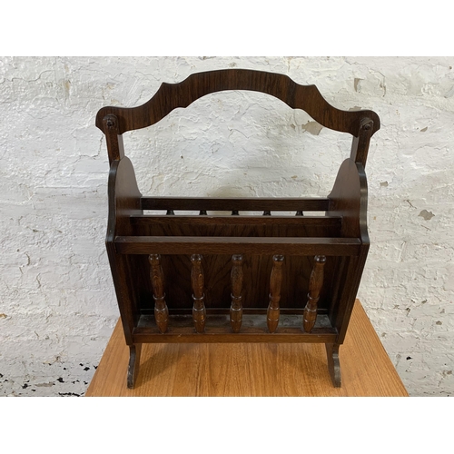 40 - Two pieces of furniture, one oak magazine rack and one mid 20th century teak effect nest of tables