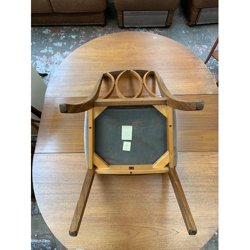 43 - A mid 20th century teak extending dining table and four G Plan teak dining chairs - approx. 71cm hig... 