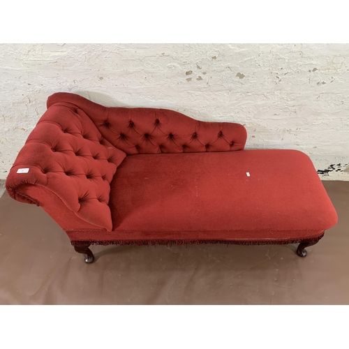 47 - A Victorian style red button back fabric upholstered chaise longue on cabriole supports - approx. 70... 