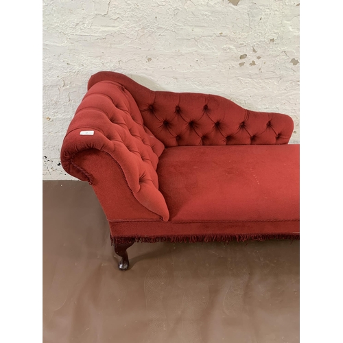 47 - A Victorian style red button back fabric upholstered chaise longue on cabriole supports - approx. 70... 